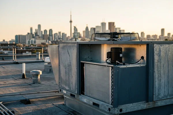 Clean condenser coil and new fan motor on a Carrier WeatherMaker RTU